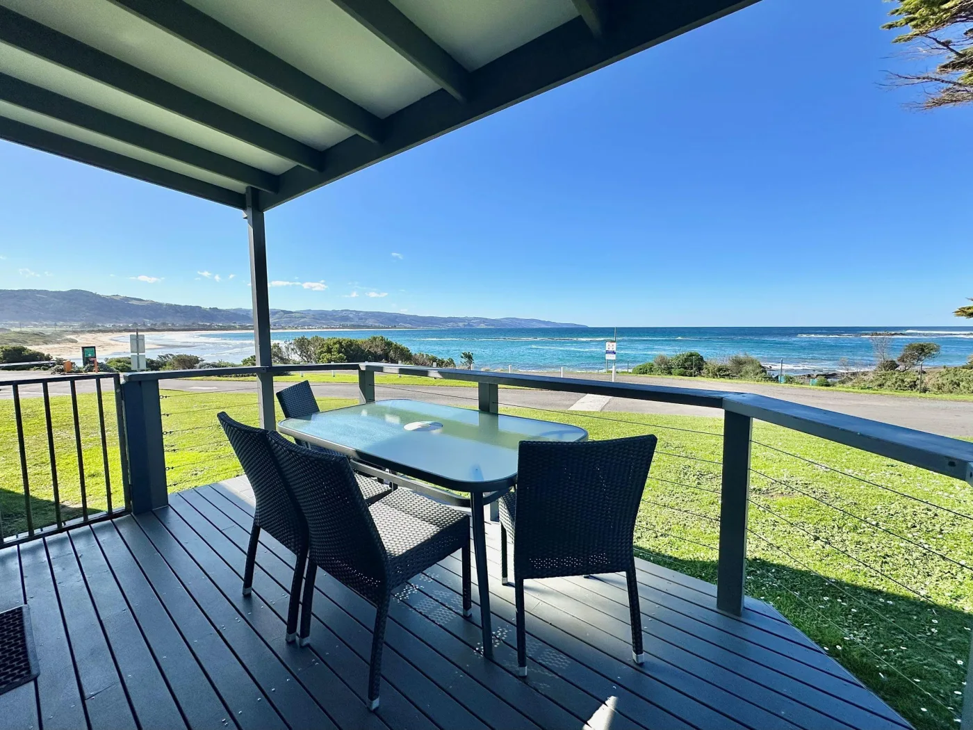 Deck with outdoor furniture and views