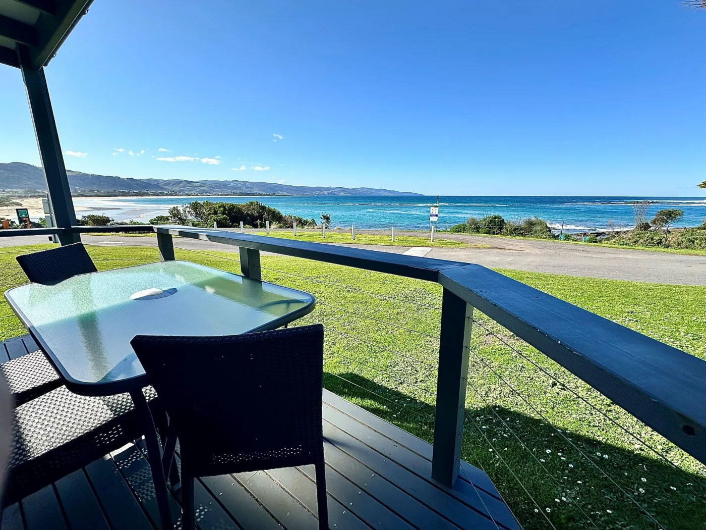 Deck with outdoor furniture and views