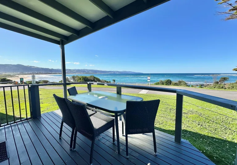 Deck with outdoor furniture and views