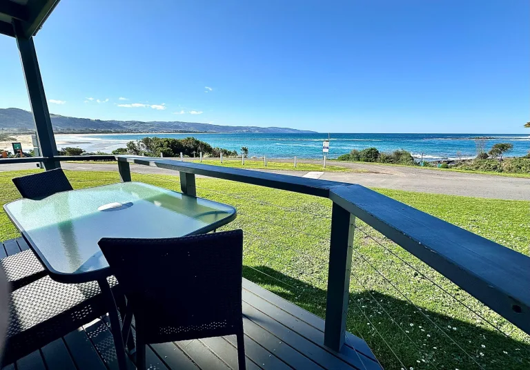 Deck with outdoor furniture and views